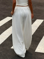 COLOR-BLOCKED STRIPED BOW-TIE WIDE-LEG PANTS