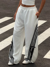 COLOR-BLOCKED STRIPED BOW-TIE WIDE-LEG PANTS
