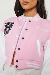 PINK CROP CONTRAST SLEEVE VARSITY JACKET