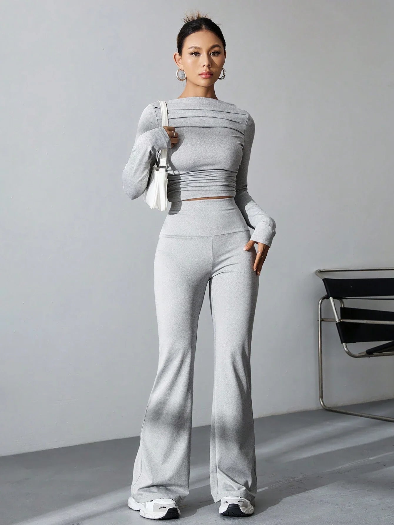 WOMEN'S PLEATED SLIM FIT TOP AND FLARED PANTS