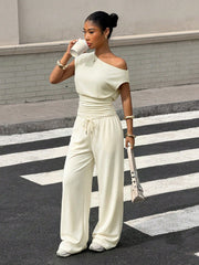 ASYMMETRIC NECK CINCHED WAIST TOP AND LOOSE PANTS SET