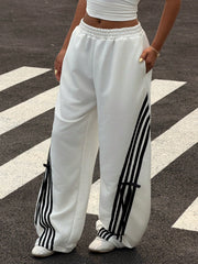 COLOR-BLOCKED STRIPED BOW-TIE WIDE-LEG PANTS