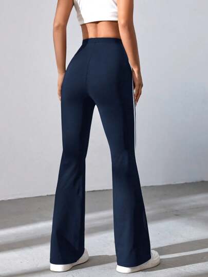 STRIPED TAPE FLARE LEG TROUSERS