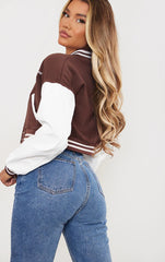 BROWN CROP CONTRAST SLEEVE VARSITY JACKET